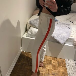 White pants with red side stripe